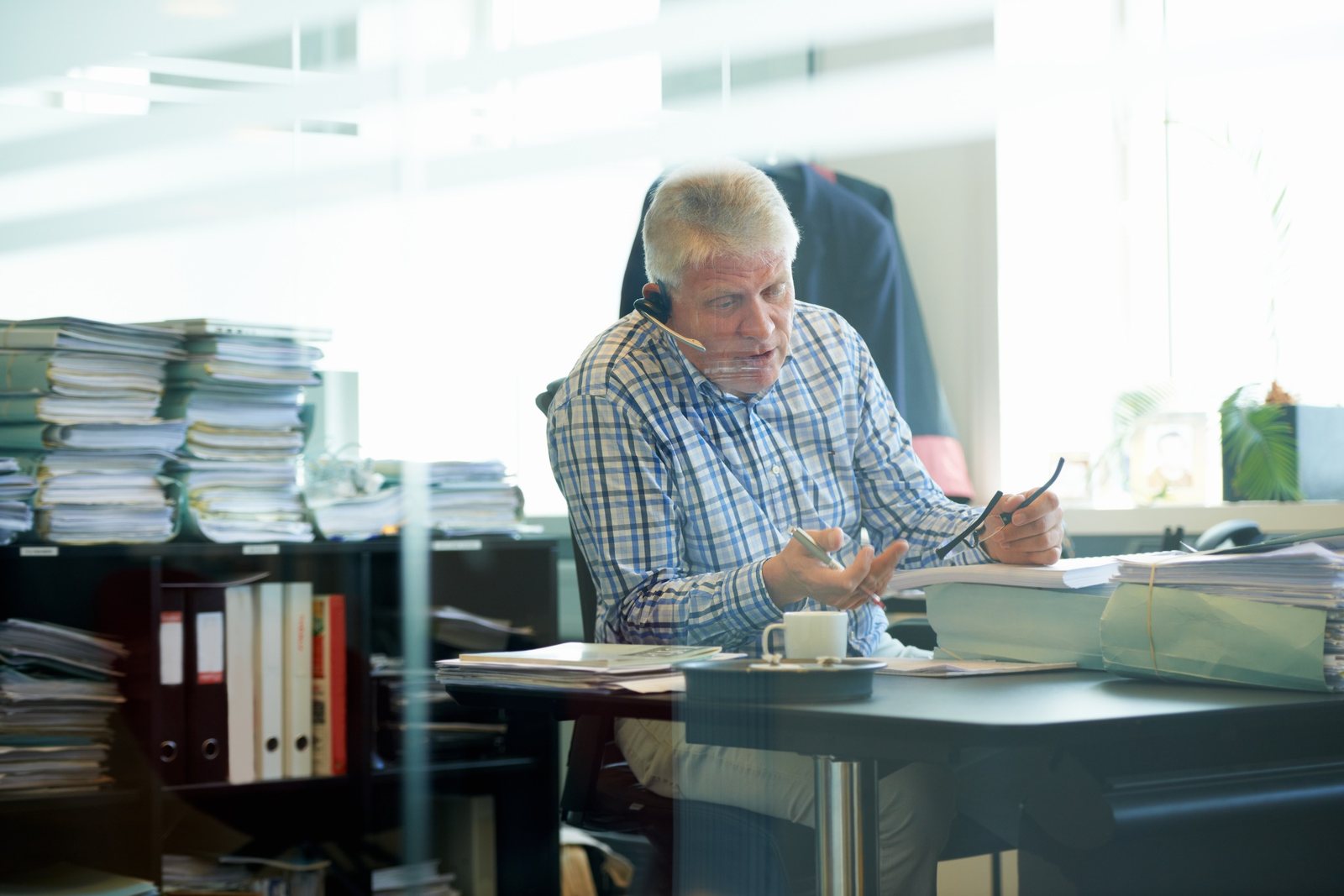 Experienced business owner in his office